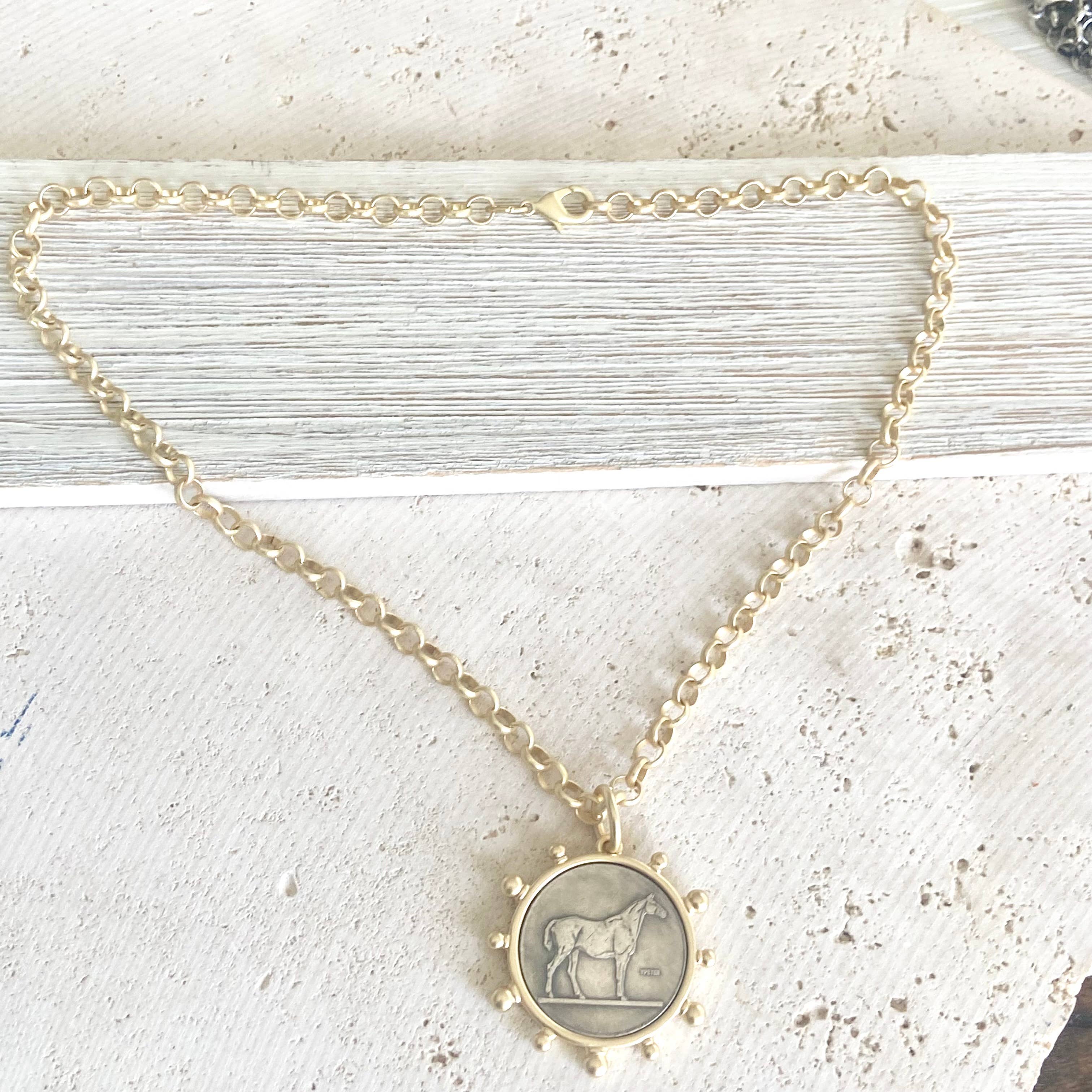 Matte gold horse coin jewelry